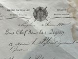 a piece of paper that has a picture of a coat of arms on it