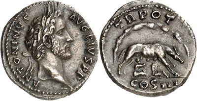 a silver coin with an image of a man and a dog on it