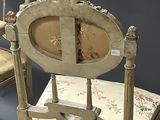 two chairs that are sitting next to each other