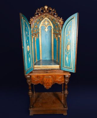 an old wooden table with an open door on top of it