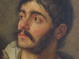 portrait of a man in a red coat with a moustache