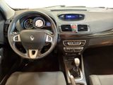 the interior of a car with a steering wheel and dashboard controls