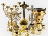 many different types of religious items on the table