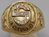 a close up of a gold ring with diamonds on it
