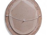 a brown plate with a string around it