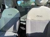 two seats in the back of a car that are empty
