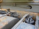 a close up view of a tank with a bunch of pipes