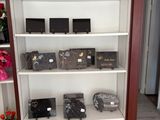 many different types of items on the shelves in this room