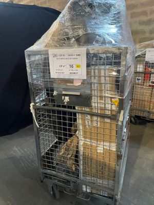 a metal cage with a bunch of boxes inside of it