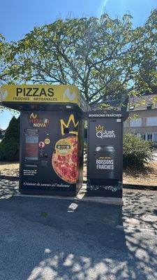 two vending machines on the side of the road