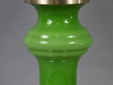 an image of a green lamp with a white shade on it