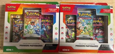 deux boîtes de jeux Nintendo Wii posées sur une table