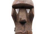 an image of a wooden mask on a white background