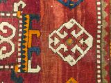 a close up of a rug with a pattern on it
