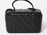 a black quilted bag on a white background