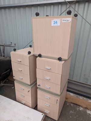 many drawers and cabinets stacked on top of each other