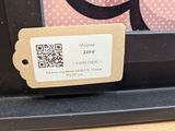 a picture of a qr code on a window sill