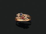 an 18k gold, ruby, and pearl ring