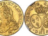 a gold sovereign coin with a crown on top of it