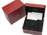 a red box with a card in it and a white card in it