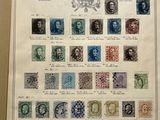 an old book with a bunch of different stamps on it