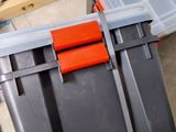 a stack of boxes sitting on the floor in a room