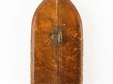 an old brown leather case with a lock on a white background