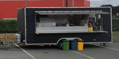 an image of a food truck parked in a parking lot