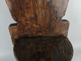 a wooden toilet with a wooden seat and seat cover