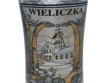 a shot glass with a picture of a ship on it
