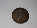 an image of a coin that is on a table