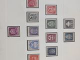 a picture of a picture of a collection of stamps in a frame