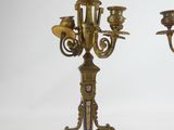 pair of antique brass candelabs with blue and gold decoration