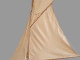 a model of a sailboat on a wooden stand