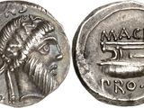 a close up of a coin with an image of a man on it