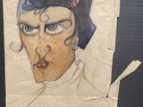 le dessin d'un homme portant un casque, tracé sur une feuille de papier