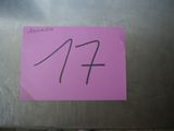 un autocollant rose sur lequel figure le chiffre 11