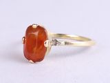 an image of a ring with a carnel stone