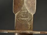 a close up of a metal object with a logo on it