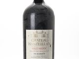 a bottle of wine that is sitting on a table