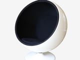 a black and white ball chair with a white base
