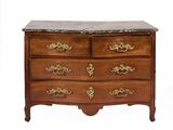 a wooden chest of drawers with a marble top