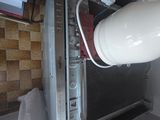a large white object hanging from the ceiling of a room