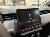 the dashboard of a car with a digital display in the center