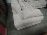 a couch that is sitting on the floor in a room
