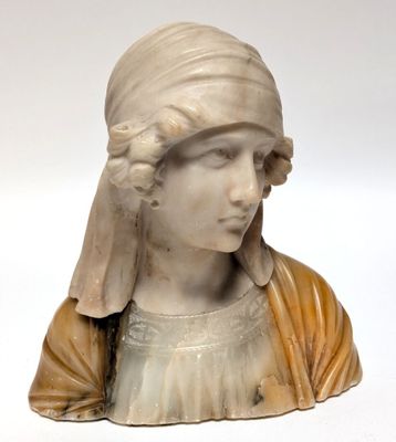 marble bust of a woman with a turban on her head