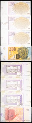 four different bills of different colors and sizes are shown
