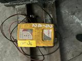a yellow box that has some wires attached to it