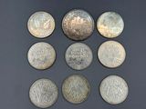 six different types of coins are arranged in a circle