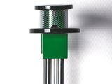 a metal pole with a green light on it